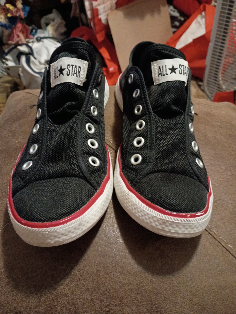 Converse All Star Slip-On Canvas Sneakers in Black with Red Trim
